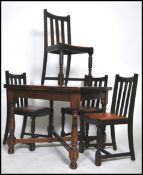A 1930's oak draw leaf dining table raised on bloc