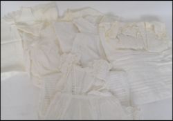 A group of 4 Victorian linen child's Christening gowns / dresses. Please see images. Largest 36cms