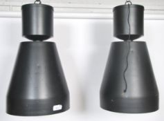 A large pair of Industrial type oversized factory pendant shades of bell form with cylinder tops,