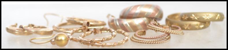 A collection of ladies 9ct gold earrings, 6 pairs in total to include hallmarked creole earrings,