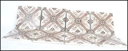 A group of eight late Victorian ceramic tiles marked reg. des 159374, the designed registered in