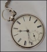 A silver hallmarked open faced pocket watch and silver hallmarked fob chain. The enamel face