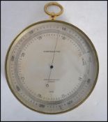 A vintage early 20th century bulk head barometer by John Wardale and Co of London dated 1918.