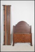 A 1930's Art Deco mahogany single bed with qtr veneer head and footboards united by original rails
