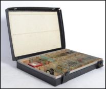A good collection of scientific glass microscope slides complete in a numbered slide storage case