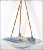 A mid century Moroccan two tone ceiling glass uplight chandelier shade of UFO - circular form.