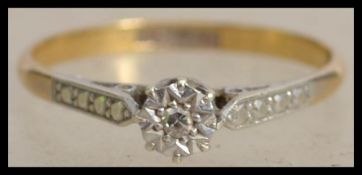 An 18ct gold and platinum diamond solitaire ring w