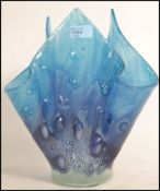 A retro 20th century studio art glass Murano style bubble control handkerchief vase in blue having