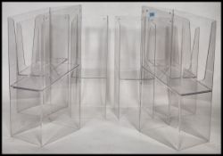 A group of 6 clear acrylic shop display advertising / point of sale magazine display units of
