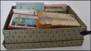 A collection of playing cards and ephemera to include cased Tarot cards by Pamela Colman Smith &