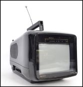 A vintage retro 1980s Matsui portable TV model 6091 with 6 inch screen complete with aerial