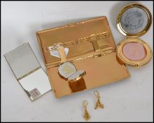 A collection of vintage items to include Stratton compacts, cigarette case, gilt earrings etc.