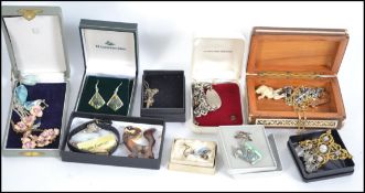 A collection of 1960s and earlier costume jewellery to include a silver filigree butterfly brooch,
