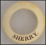 A early to mid 19th century ivory wine bottle labe