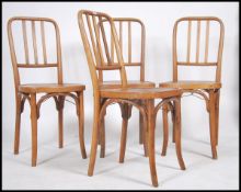 A set of 4 early 20th century / 1930's cafe bentwood chairs by Mundus Kohn Ltd. Each with turned