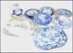 A collection of 19th century blue and white ceramics to include Wedgwood, Spode, Flow blue etc.