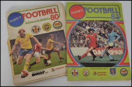 2 complete original Panini sticker albums dating from 1980 & 1983, each album believed complete to