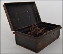 A collection of 19th century and 20th century furniture keys of various sizes. Stored within a