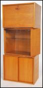 A group of three vintage retro 20th century Ladderax display units one being a record cabinet with