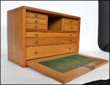 A well built light oak vintage engineers case having a full front cover opening to reveal a series