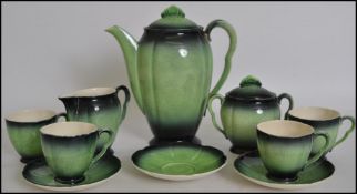 A good Carltonware ( Carlton Ware ) Art Deco coffee Service in green and black being stamped to