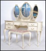 A Louis 16th style painted shabby chic kidney shaped dressing table  raised on cabriole legs. The