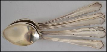 A set of silver hallmarked teaspoons having shaped