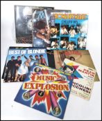 A collection of vintage long play vinyl long play and 45 rpm singles to include several artists such