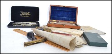 A good collection of early 20th century and older hand drawn on paper an silk building plans to