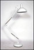 A large floorstanding anglepoise lamp in the manne