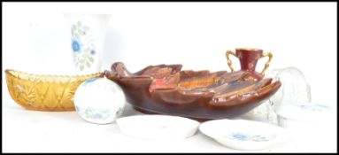 A collection of ceramics to include a fat lava style fruit bowl in the form of a leaf various