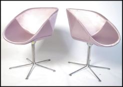 A pair of Modernist Italian Sitia Hibiscus chairs