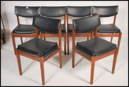 A good set of 1970's teak wood and faux black leat