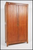 A 1970's rare 1950s french tambour cabinet in teak