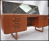 A 1970's retro teak wood dressing table in the man