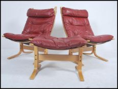 A fabulous pair of 20th century vintage red leathe
