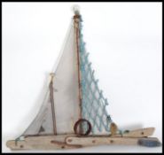 A stunning folk art sculpture study of a fishing T