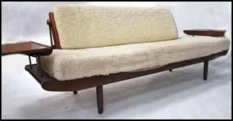 A stunning mid century teak and wool upholstered s