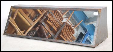 A stunning 20th century shop display shoe mirror.