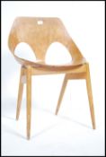 A mid century Jason chair by Carl Jacobs for Kandy