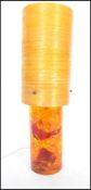 A retro vintage mid century Shatterline amber type