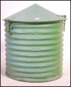 A mid century Industrial green corrugated metal gr