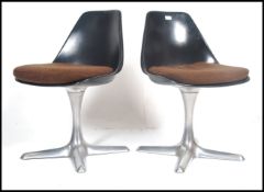 A pair of vintage 1970's Arkana tulip swivel dinin