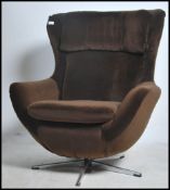 A 1970's retro G-Plan style teak and faux leather