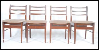 A set of 4 1960's Danish Scandart teak wood dining