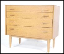 A 1960's early E Gomme for G-Plan natural oak ches