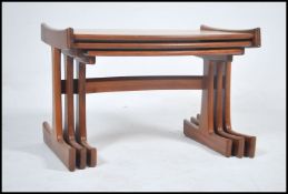 A large 1970's solid teak wood G-Plan 'boat' shape
