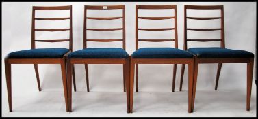 A set of 4 1970's vintage retro teak framed McInto