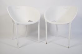 A pair of contemporary Philippe Starch white plast