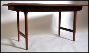 A good Danish influence teak wood dining table in
